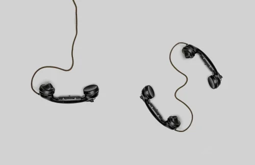 three phones with a cord