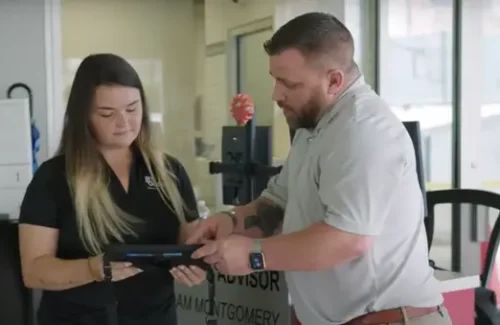 Two tire service customer service agents representing CAll tracking and AI.